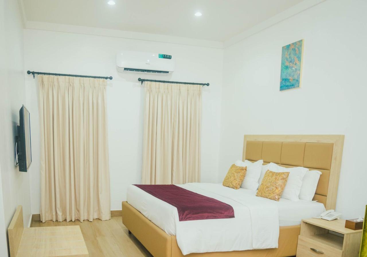 Quest Boutique Hotel Gwarinpa Extérieur photo