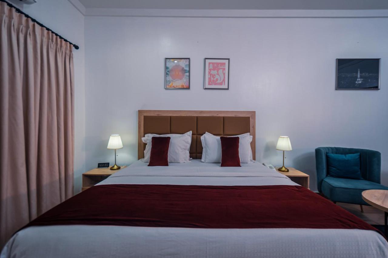 Quest Boutique Hotel Gwarinpa Extérieur photo